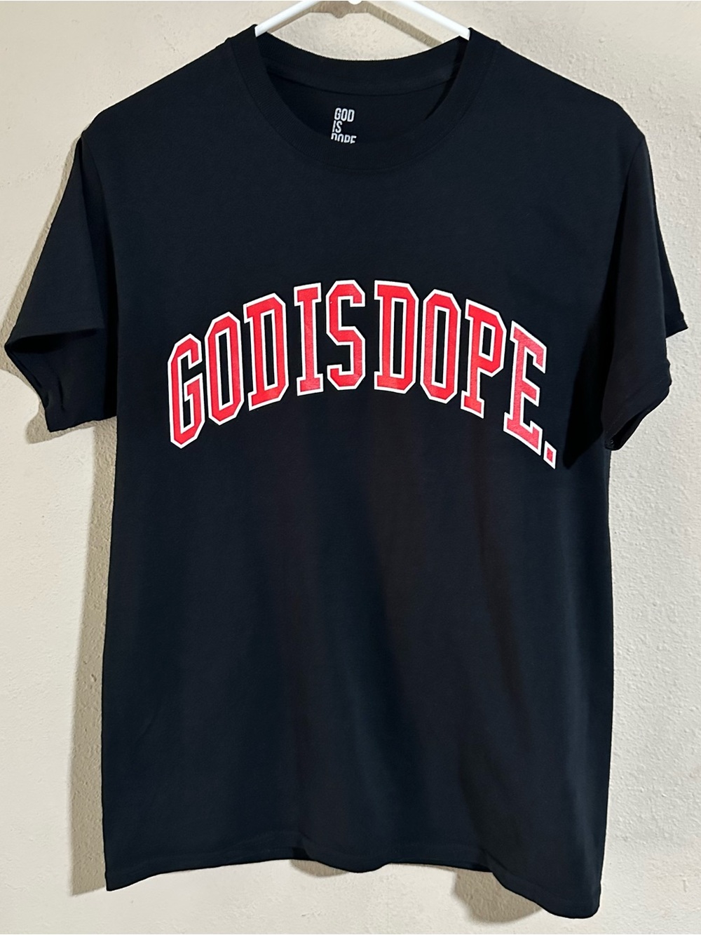 GOD IS DOPE. Women's Black Tee with Red Arch Logo
